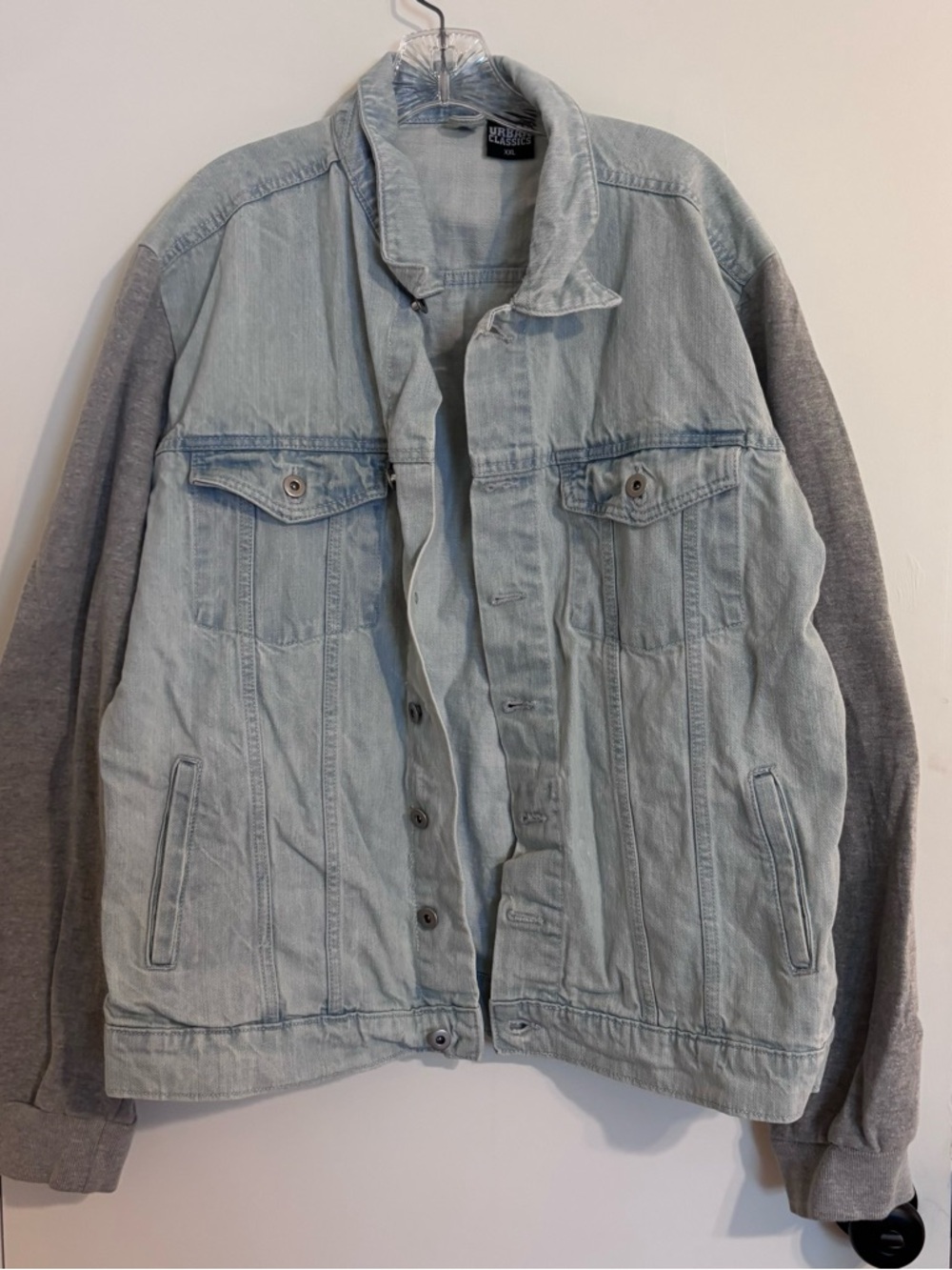 Classic Light Wash Denim Jacket with Gray Knit Sleeves